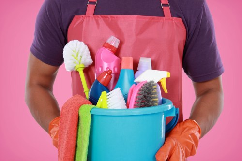 Cleaning a commercial façade in Acton with access equipment