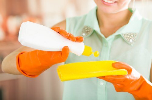 Floor cleaning technician working on a hard surface in Acton
